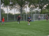 Laatste training S.K.N.W.K. JO11-1JM (partijtje tegen de ouders) van maandag 27 mei 2024 (83/137)